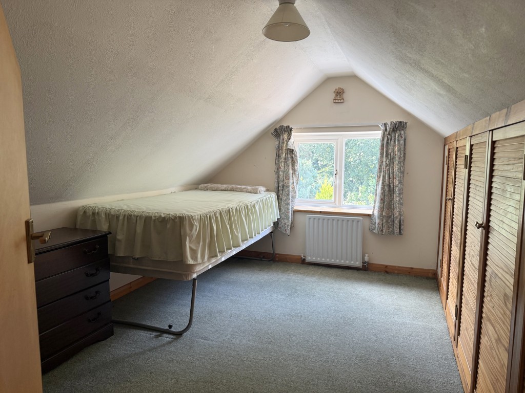 Lot: 122 - DETACHED BUNGALOW WITH ROOF CONVERSION AND POTENTIAL - First floor rear bedroom overlooking garden